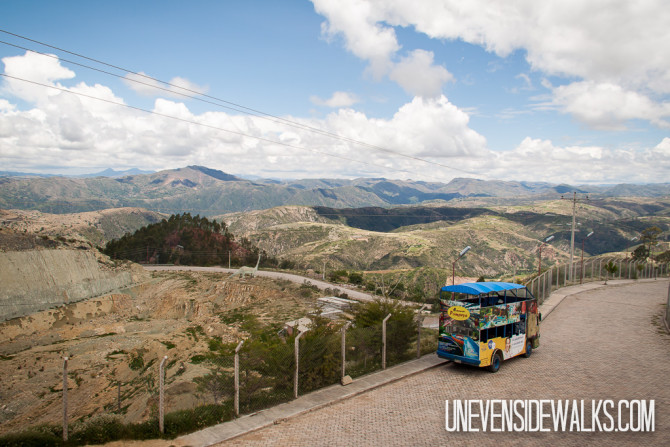 Open top bus and the beautiful hills of Sucre, Bolivia